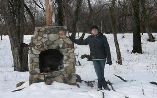 зима, стою у печки