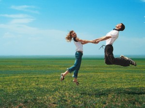 jumping-couple-field-spring